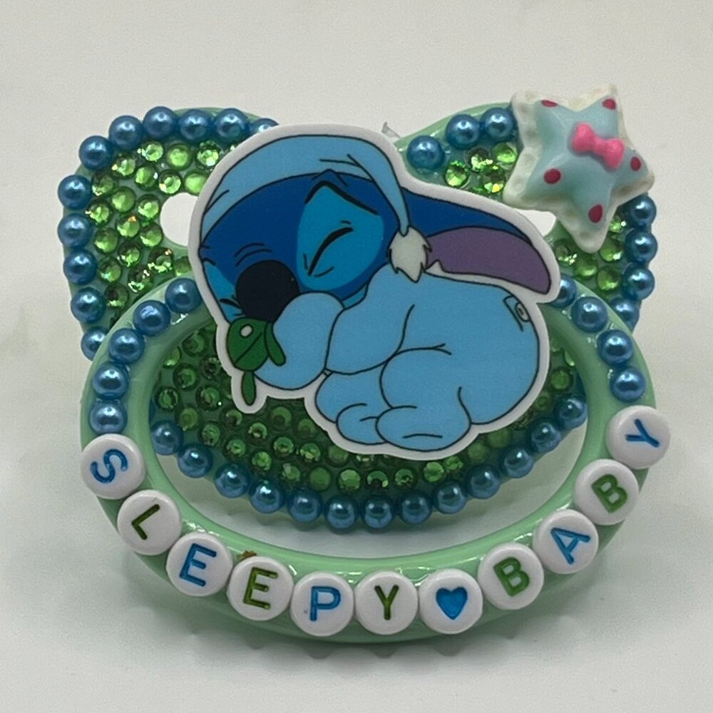 Blue and Green Sleepy Baby Adult Pacifier